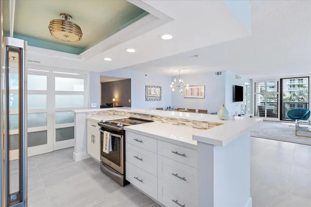 a kitchen with a stove and a sink