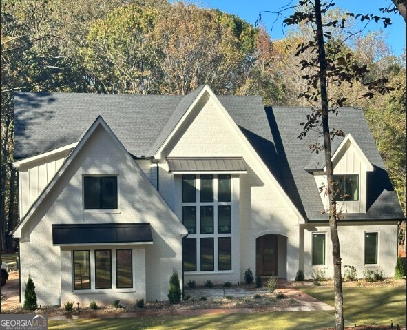 6.927 Quarters Road Fayetteville, GA 30215 - Photo 2 of 3 front view of a house with a porch