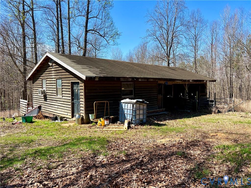 2049 Riddle Road Blackstone, VA 23824 - Photo 39 of 44 a front view of a house with a yard