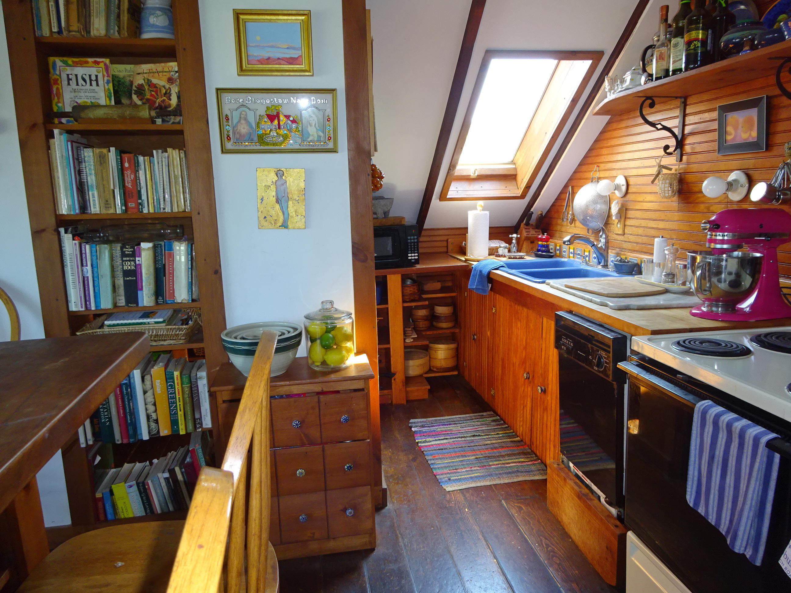 55 Commercial Street Wellfleet, MA 02667 - Photo 11 of 35 a view of a kitchen with furniture and wooden floor