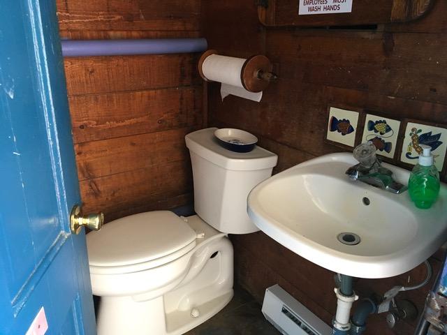 55 Commercial Street Wellfleet, MA 02667 - Photo 29 of 35 a bathroom with a sink and a toilet