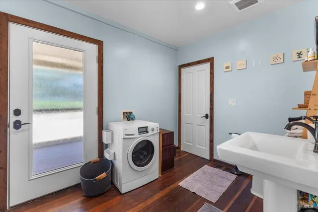 a utility room with dryer and washer