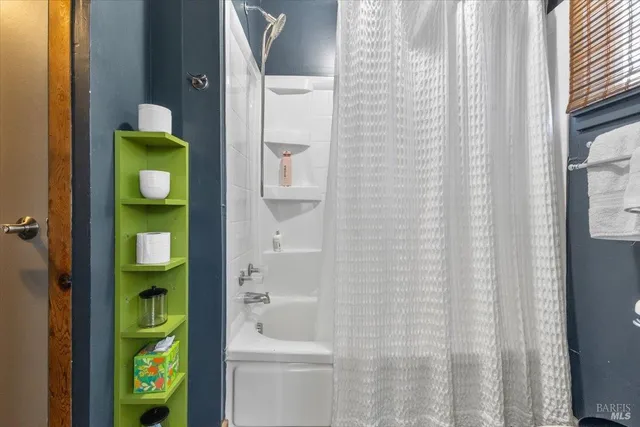 a bathroom with a sink and toilet