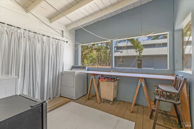 a view of kitchen with furniture and window