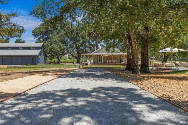 a house with trees in front of it