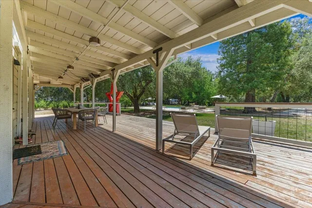 a view of a swimming pool with a patio