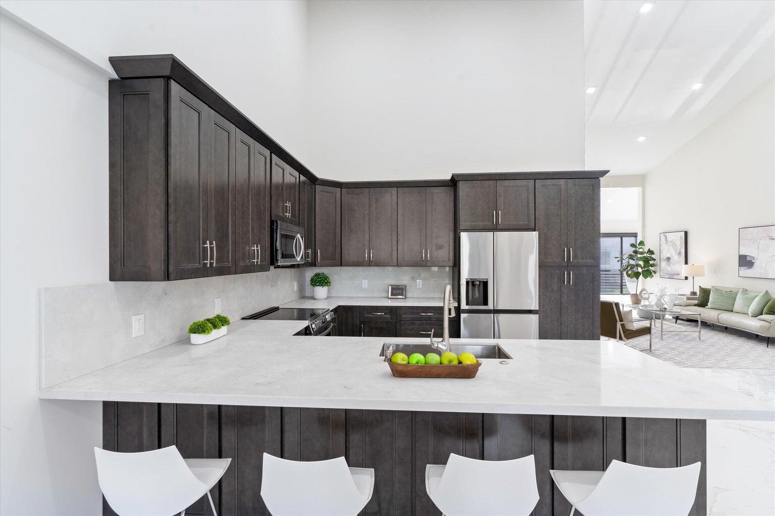 17548 Ashbourne Lane, Unit C Boca Raton, FL 33496 - Photo 4 of 40 Staged Kitchen