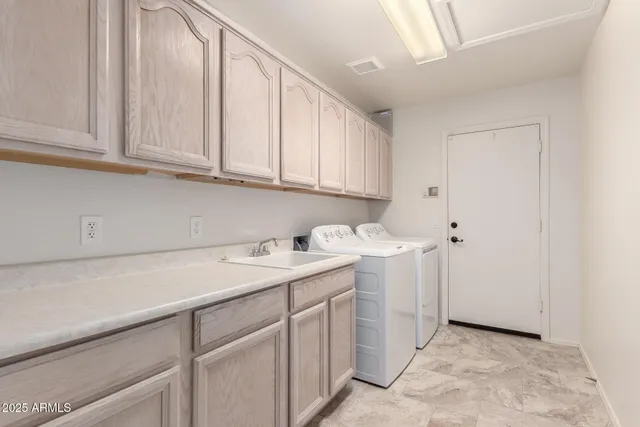 a utility room with a sink