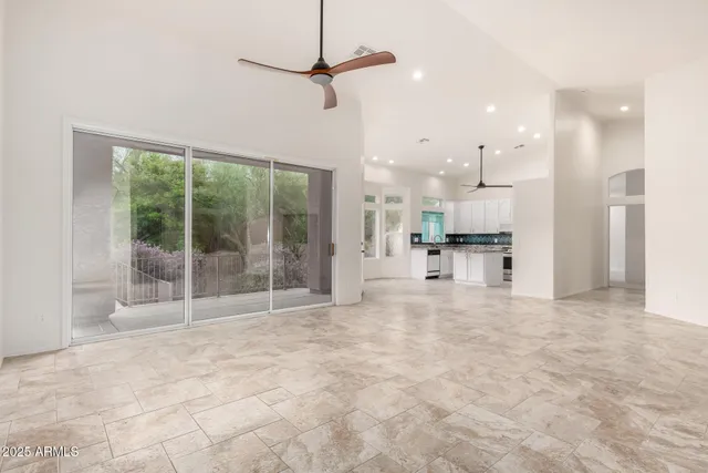 a view of large kitchen with large windows