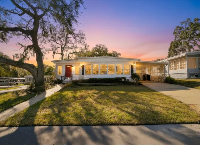 a view of swimming pool with outdoor seating