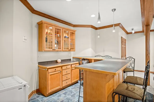 a bathroom with a sink vanity and a mirror