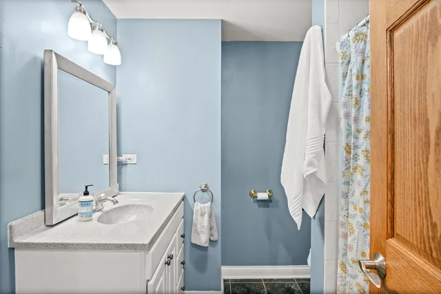 a patio with yard and outdoor seating