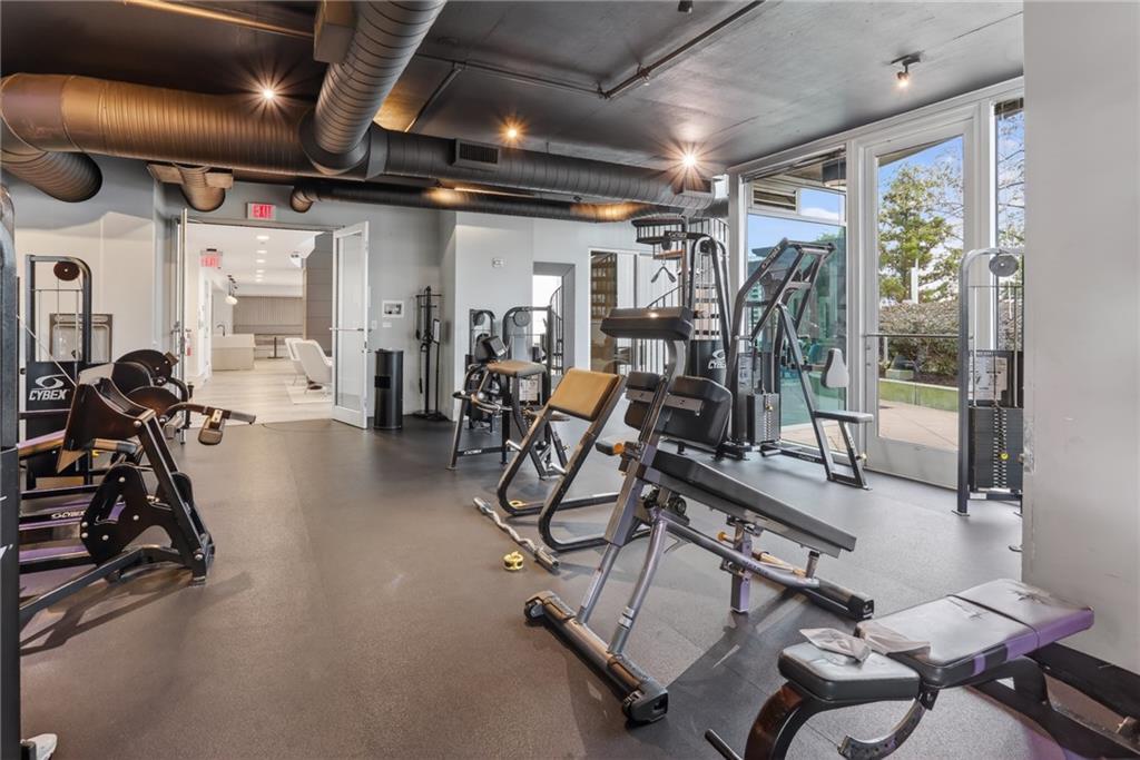 3324 Peachtree Road Northeast, Unit 1312 Atlanta, GA 30326 - Photo 10 of 23 a view of a room with gym equipment