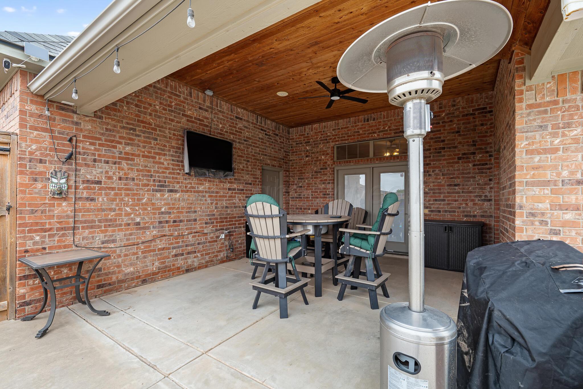5008 Wesley Road Amarillo, TX 79119 - Photo 45 of 47 a view of a livingroom with furniture and a fireplace