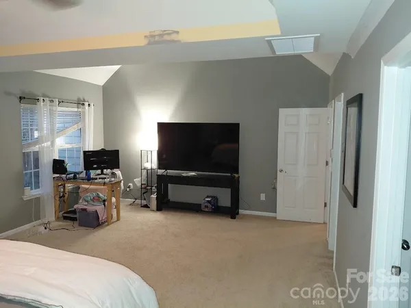 view of living room with furniture and floor to ceiling window