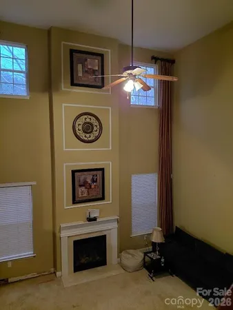 a view of a porch with wooden floor