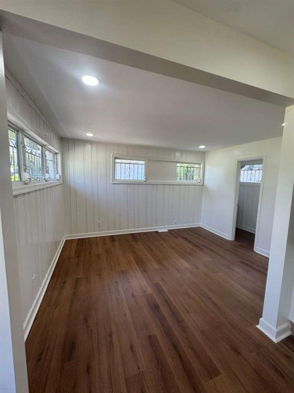 3005 Belvedere Lane Decatur, GA 30032 - Photo 4 of 16 an empty room with wooden floor and windows