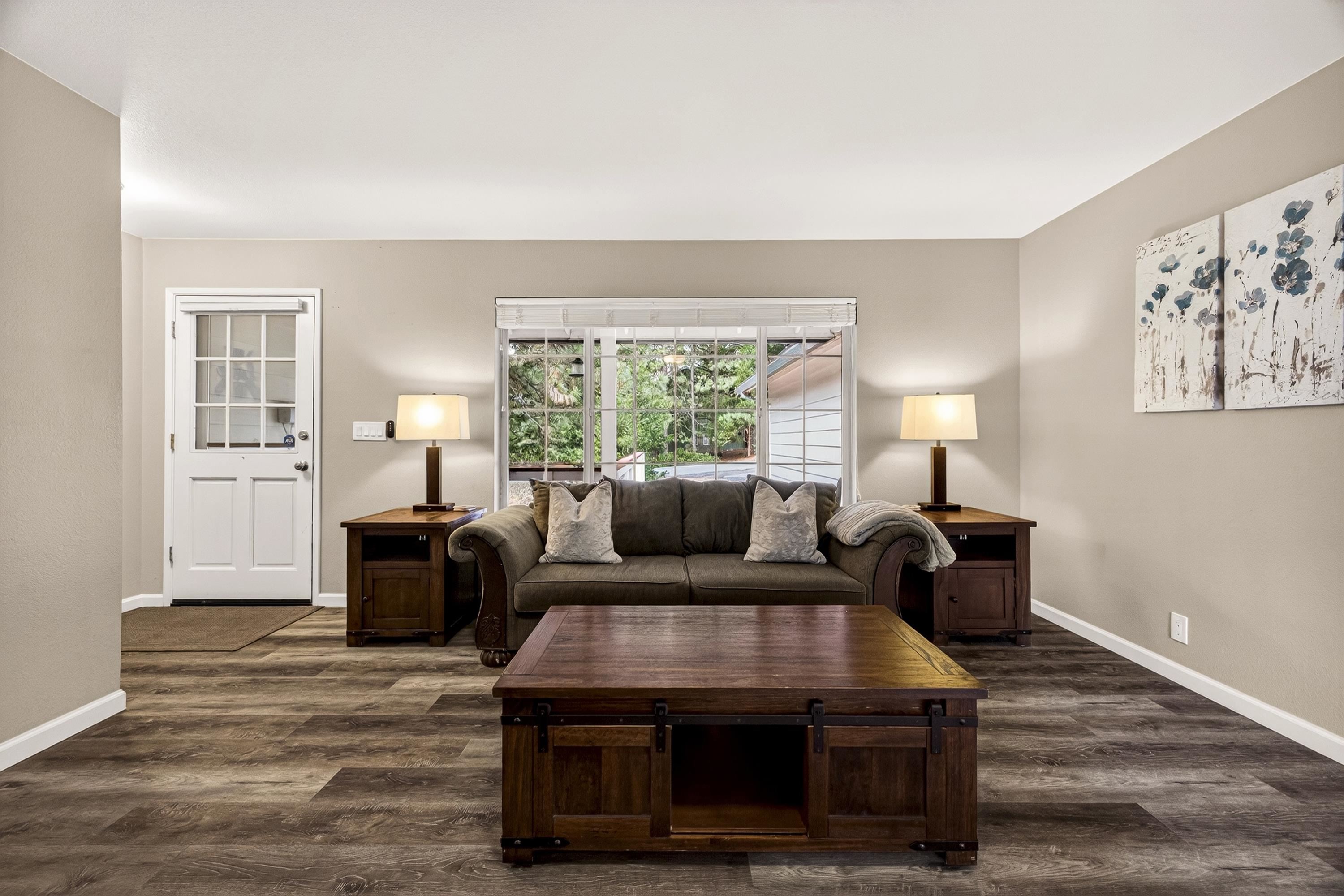 811 Golf Club Road Lake Almanor, CA 96137 - Photo 5 of 42 a living room with furniture and a window