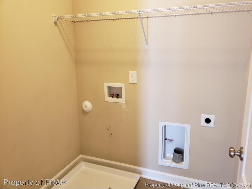 211 Rainmaker Street Linden, NC 28356 - Photo 15 of 34 a bathroom with a shower and a shower