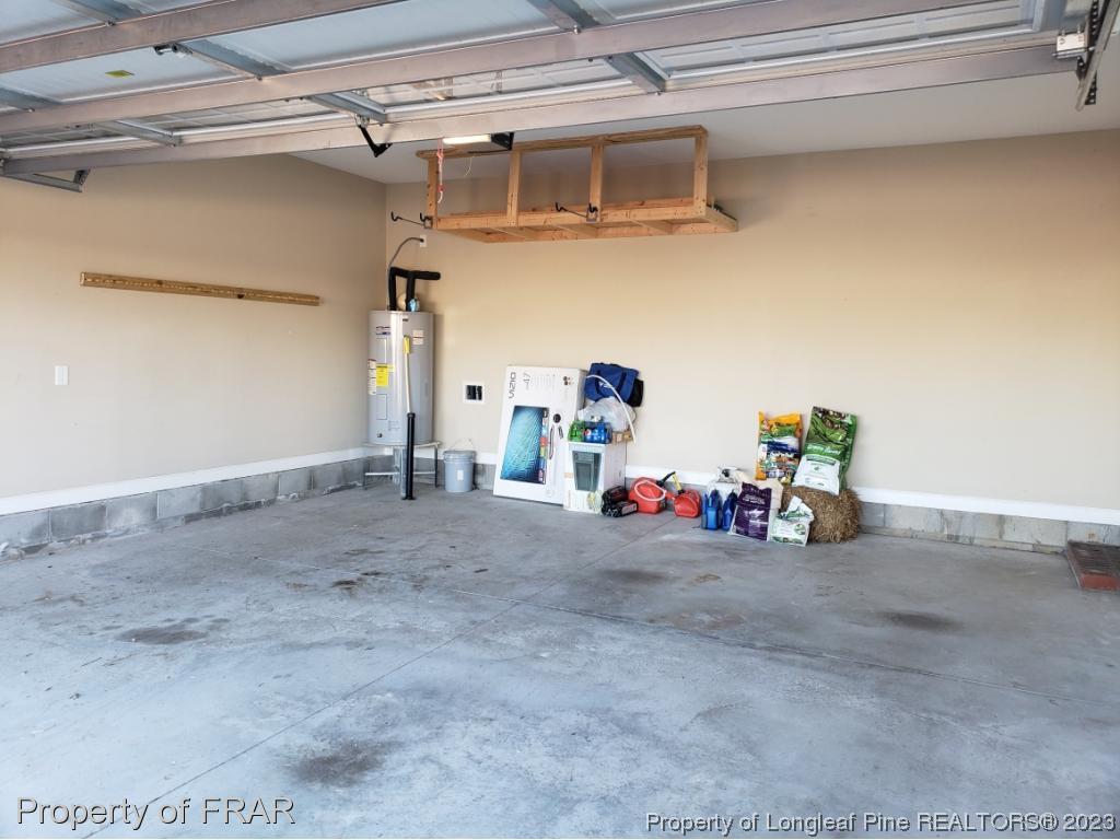 211 Rainmaker Street Linden, NC 28356 - Photo 33 of 34 a view of a garage