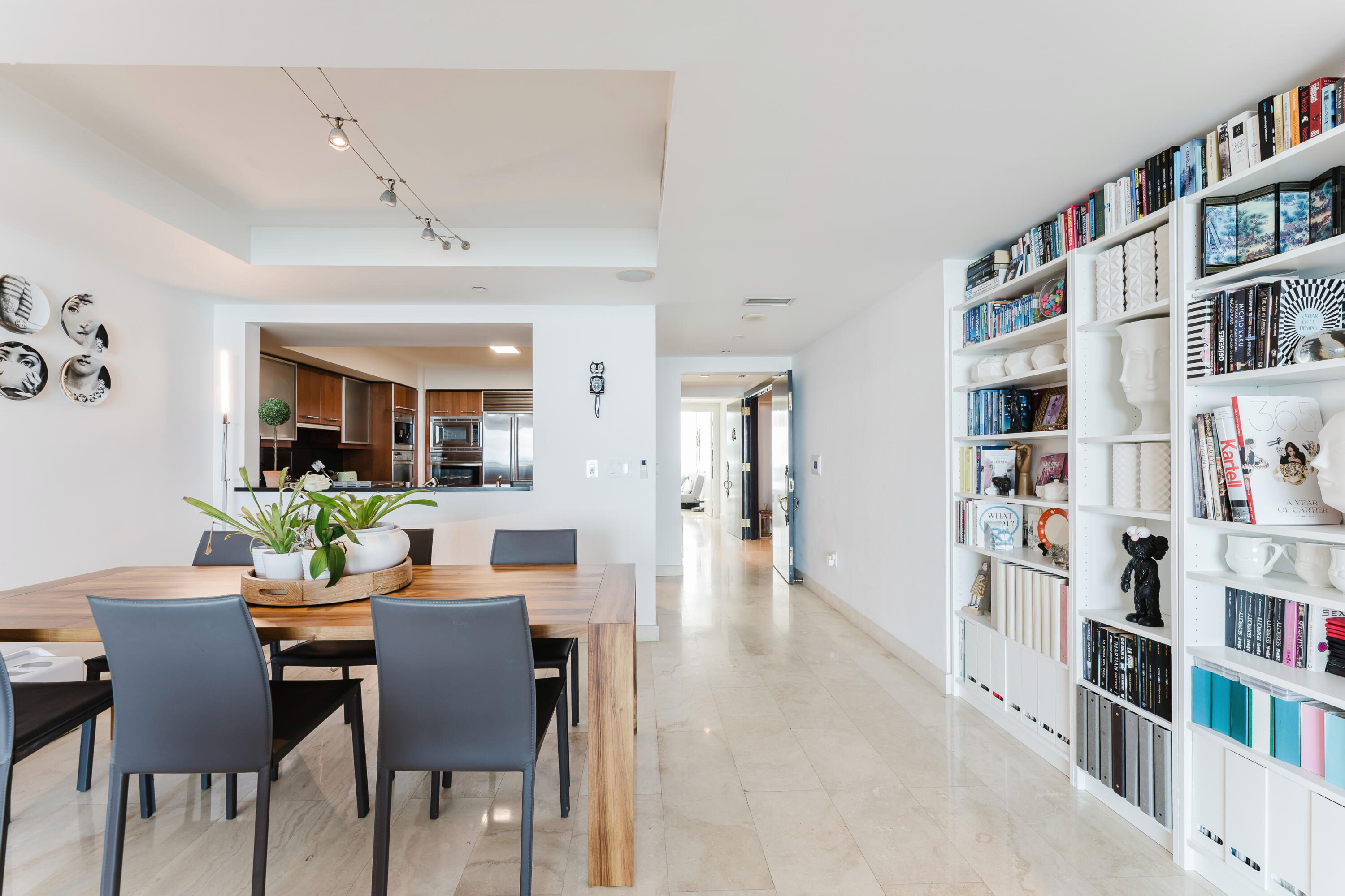 1331 Brickell Bay Drive, Unit 2805 Miami, FL 33131 - Photo 17 of 30 a view of a dining room with furniture and wooden floor