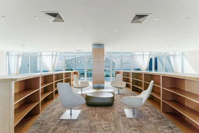 a view of a chairs and table in a room