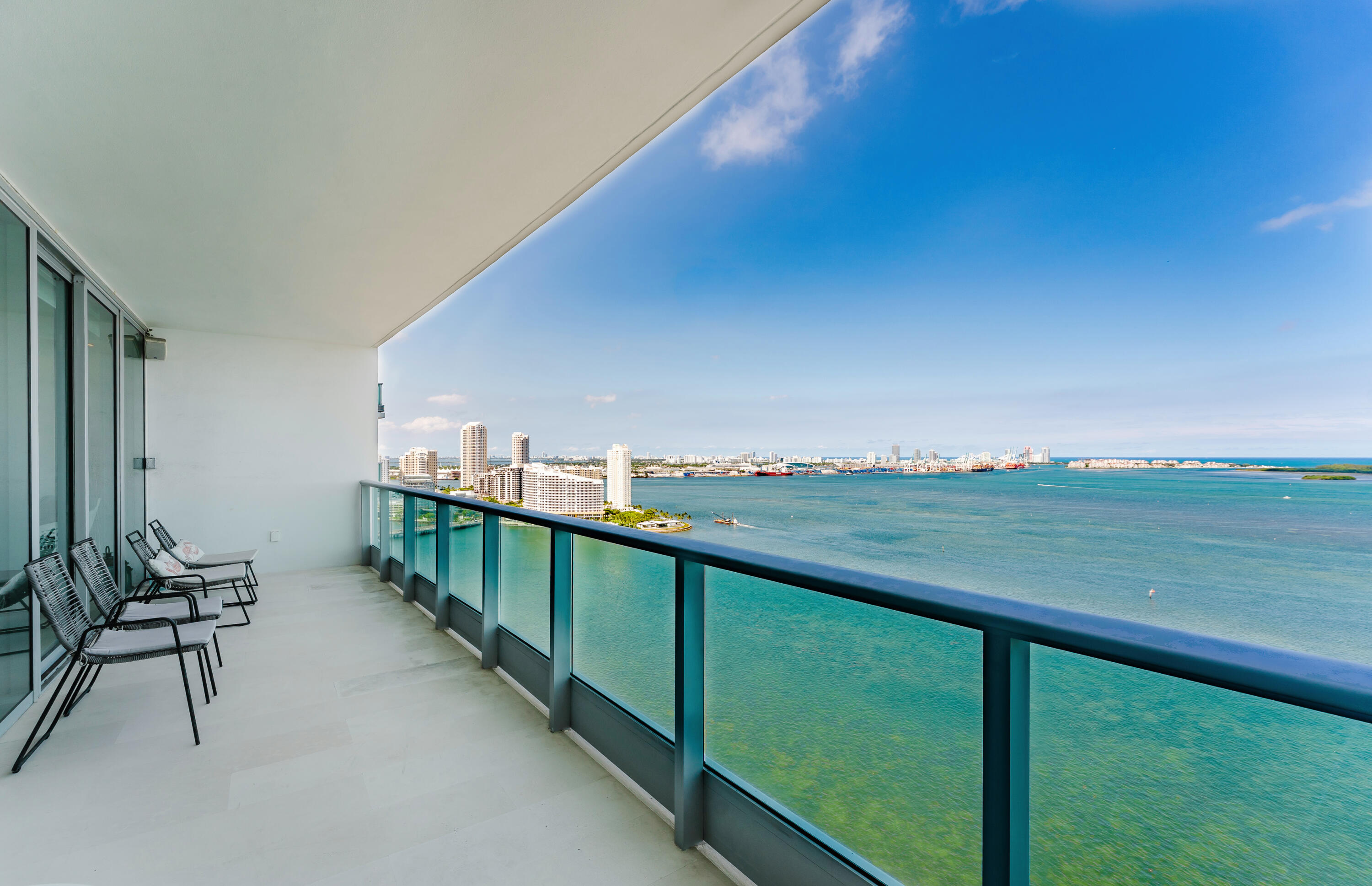 1331 Brickell Bay Drive, Unit 2805 Miami, FL 33131 - Photo 26 of 30 a view of a terrace with lawn chairs