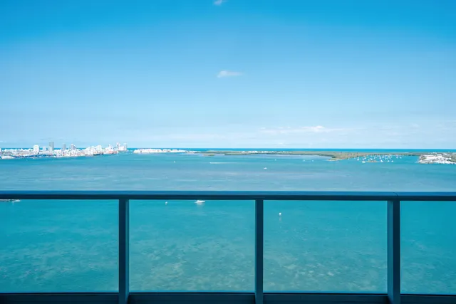 a view of a lake from a balcony