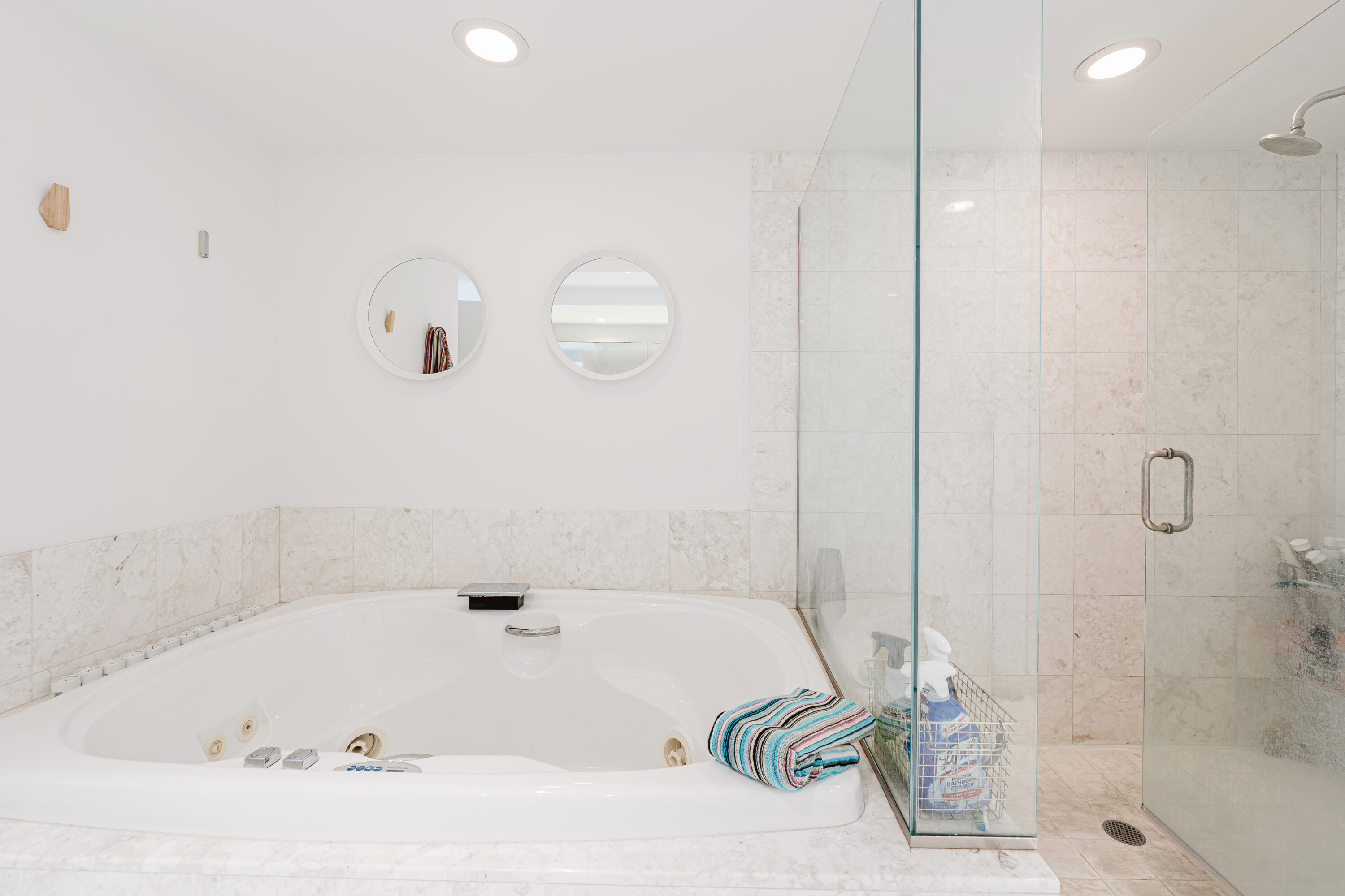 1331 Brickell Bay Drive, Unit 2805 Miami, FL 33131 - Photo 10 of 30 a bathroom with a tub and a shower