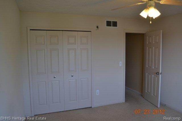 466 Hosta, Unit 75 Howell, MI 48843 - Photo 20 of 25 Bedroom 3