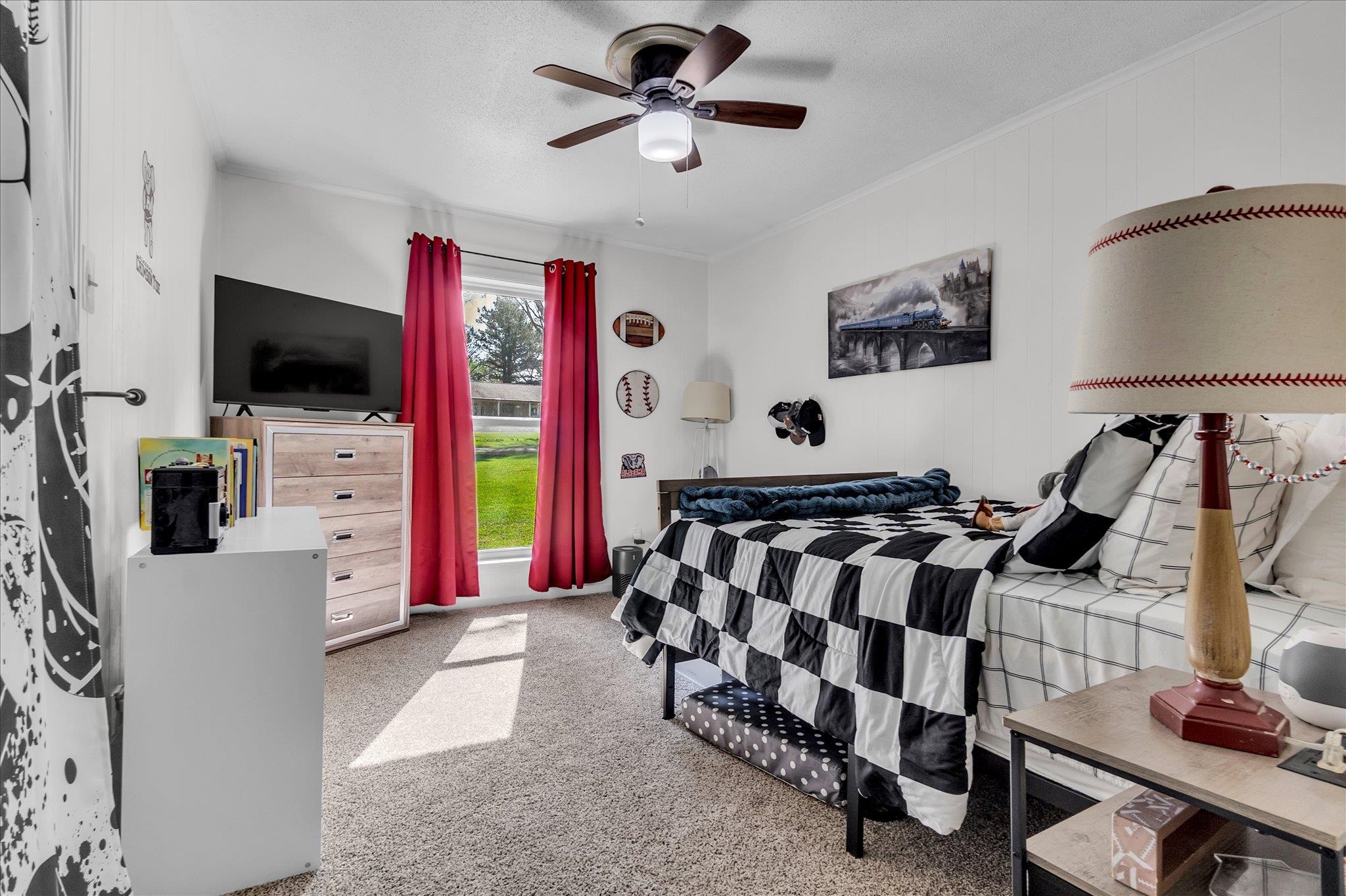 885 Rebel Road Piperton, TN 38017 - Photo 11 of 30 Bedroom featuring a ceiling fan, light carpet, and ornamental molding