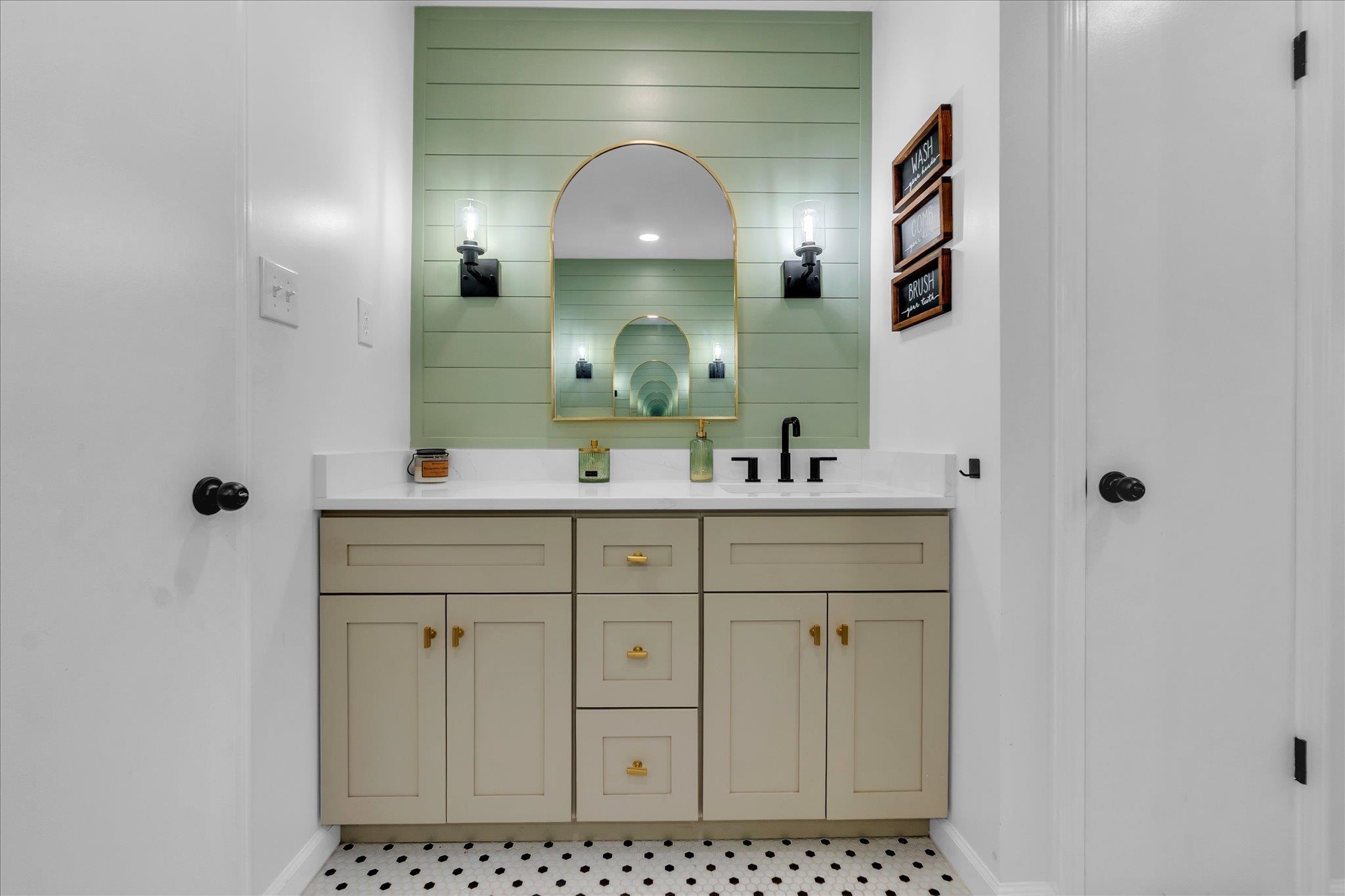 885 Rebel Road Piperton, TN 38017 - Photo 16 of 30 Full bathroom featuring double vanity and baseboards