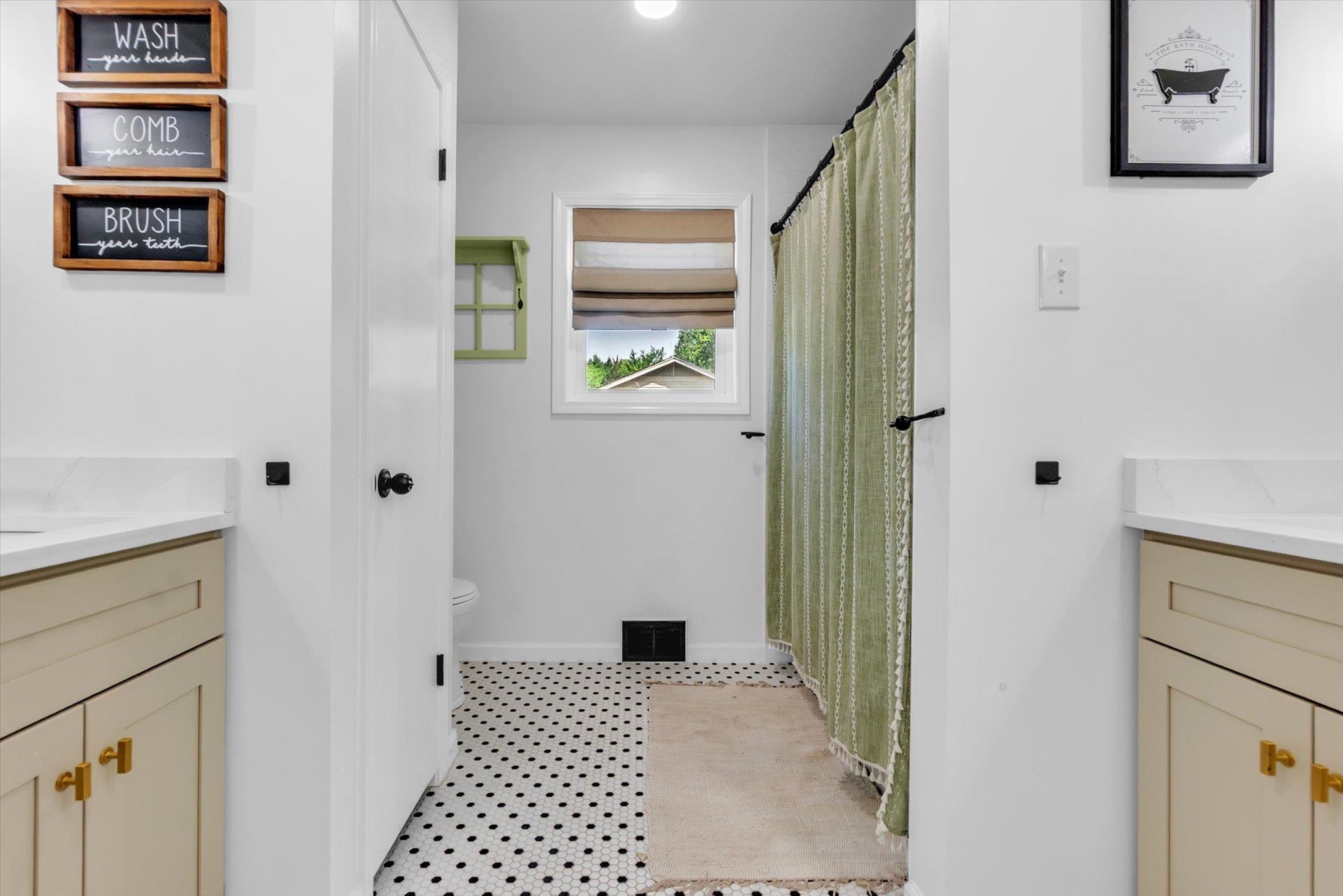 885 Rebel Road Piperton, TN 38017 - Photo 17 of 30 Bathroom featuring vanity and a shower with shower curtain