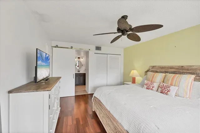 a dining room with furniture and a window