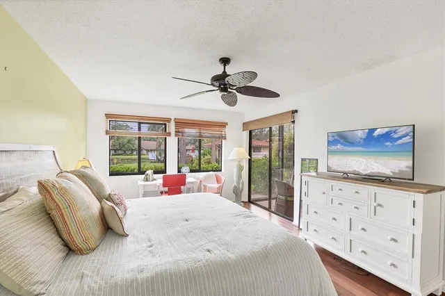 a bedroom with a bed and dresser