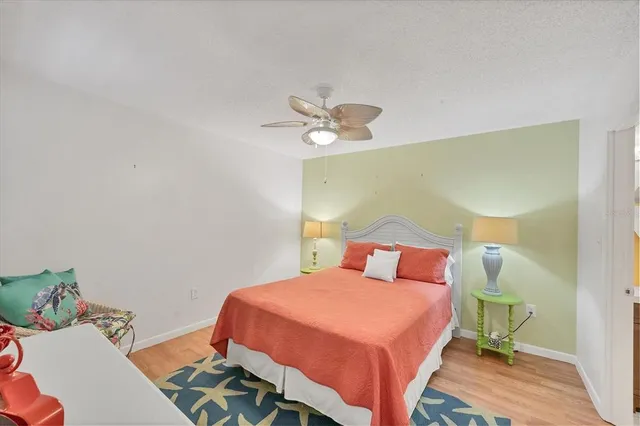 an aerial view of residential houses with outdoor space and street view