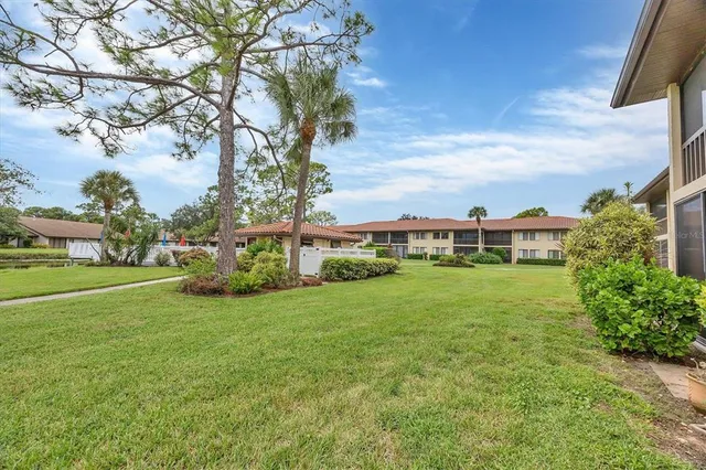 a view of balcony with furniture