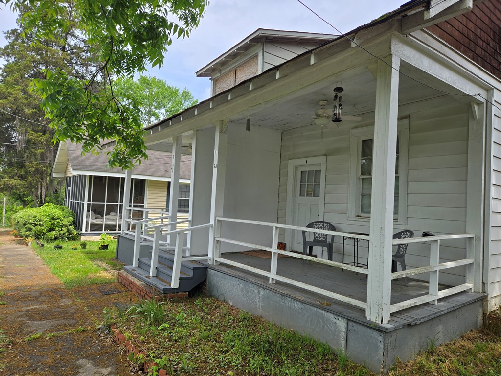 9 Linden Point, Unit B Columbus, GA 31904 - Photo 3 of 18 a view of house with backyard and porch