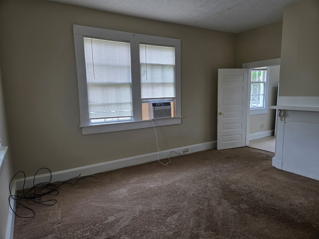 9 Linden Point, Unit B Columbus, GA 31904 - Photo 6 of 18 an empty room with windows