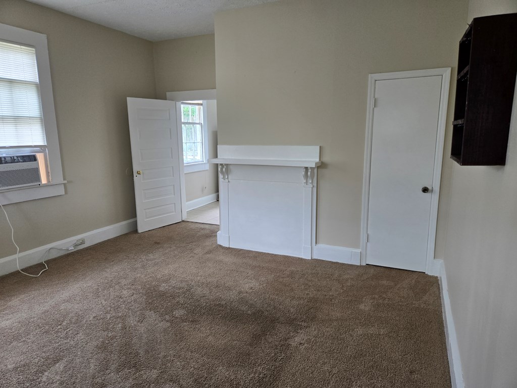9 Linden Point, Unit B Columbus, GA 31904 - Photo 7 of 18 a view of empty room with windows