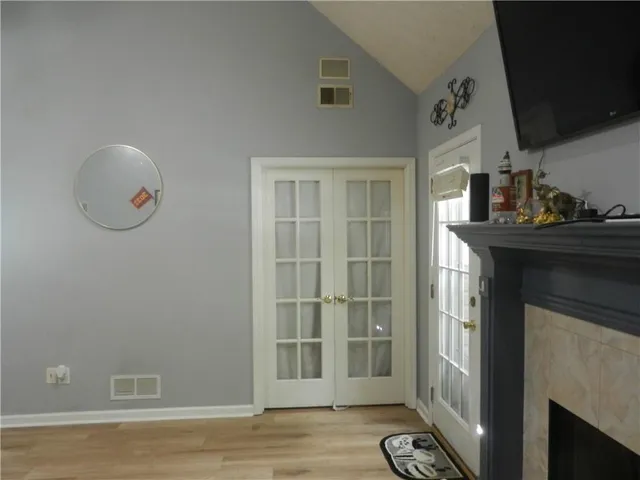 a view of a livingroom with furniture and wooden floor