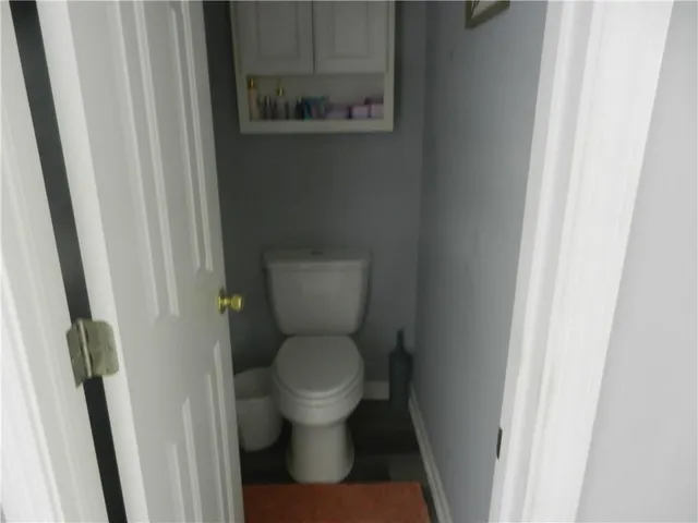 a bathroom with a toilet