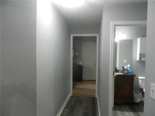 a view of a bathroom from the hallway