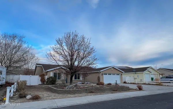 a view of a house with a street