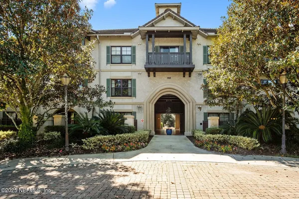 a front view of a house with yard