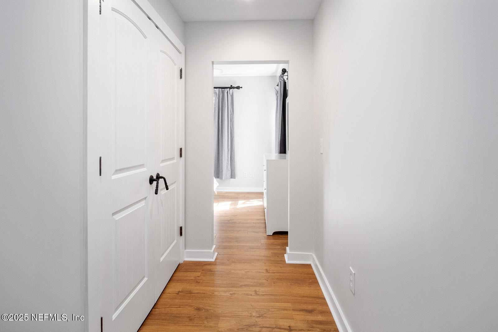 945 Registry Boulevard, Unit 210 St. Augustine, FL 32092 - Photo 22 of 28 a view of a bathroom from a hallway
