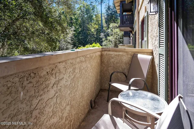 a utility room with mirror washer and dryer