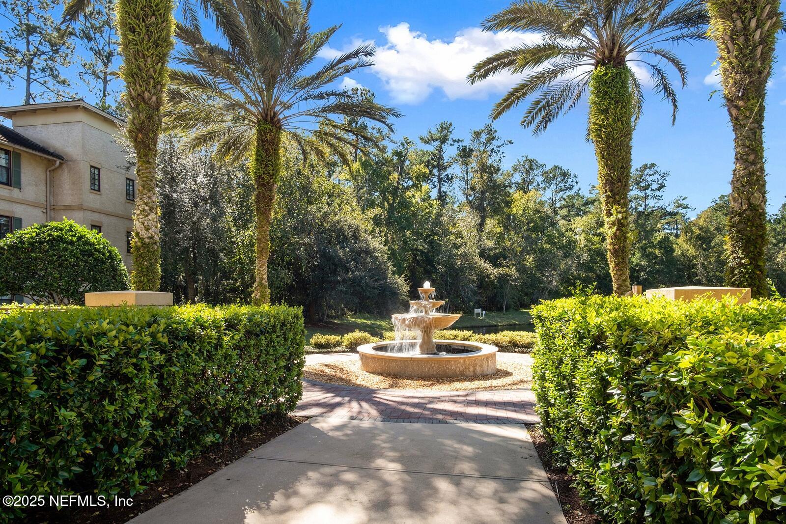 945 Registry Boulevard, Unit 210 St. Augustine, FL 32092 - Photo 28 of 28 a view of a swimming pool with a patio