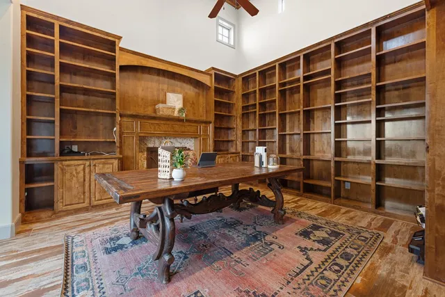 a view of a workspace with furniture