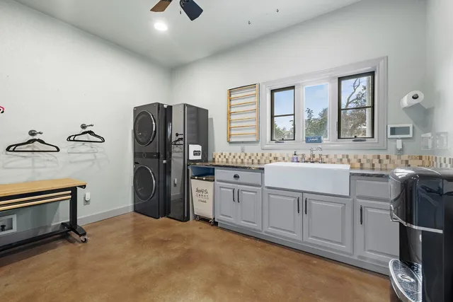 a spacious bathroom with a double vanity sink and a mirror